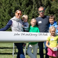 Palk family of 5 surrounding rowing boat